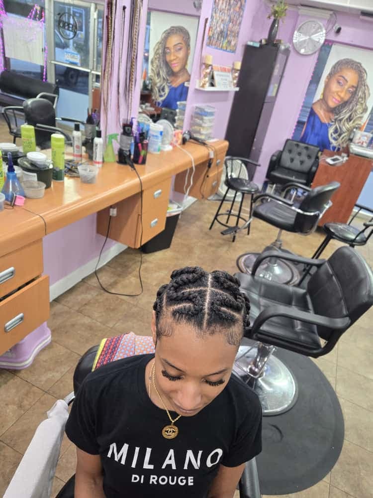 Men's cornrows by Akwaba Hair Braiding