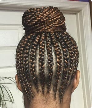 Cornrow ponytail style by Akwaba Hair Braiding