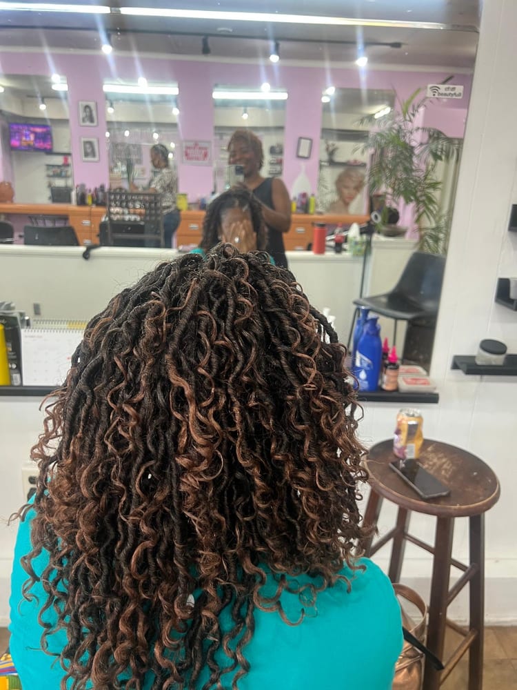 Women's crochet braids by Akwaba Hair Braiding