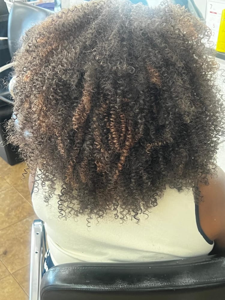 Women's crochet braids by Akwaba Hair Braiding