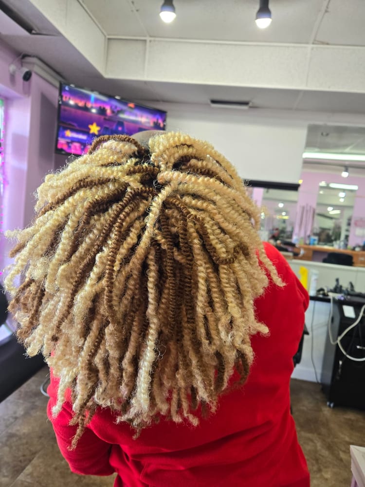 Women's crochet braids by Akwaba Hair Braiding