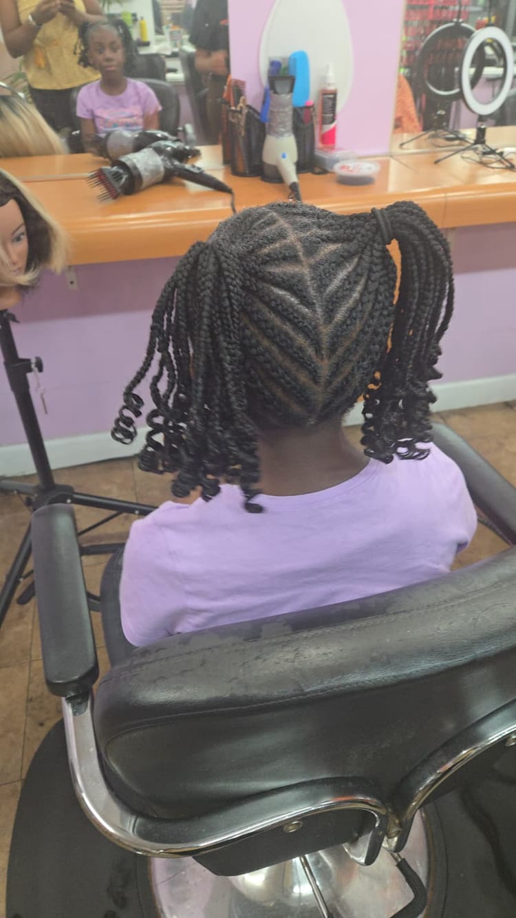 Kids' cornrows by Akwaba Hair Braiding
