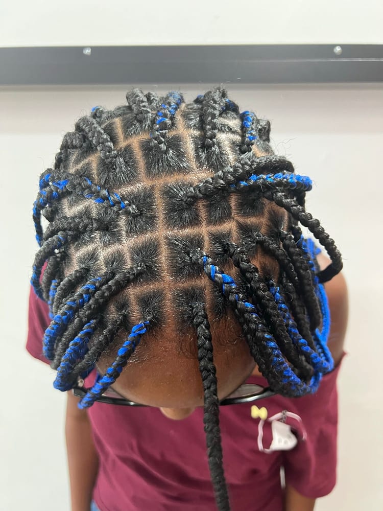 Kids' knotless braids by Akwaba Hair Braiding
