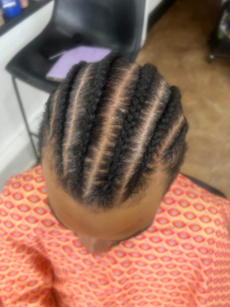 Men's cornrows by Akwaba Hair Braiding