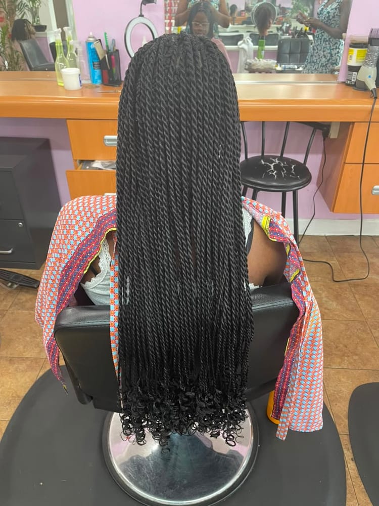 Women's senegalese twists by Akwaba Hair Braiding